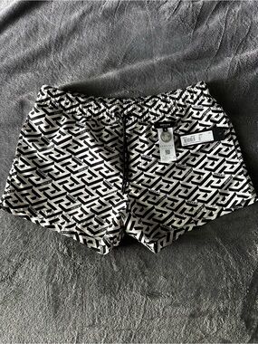 Versace men’s Black & White Logo Print Shorts